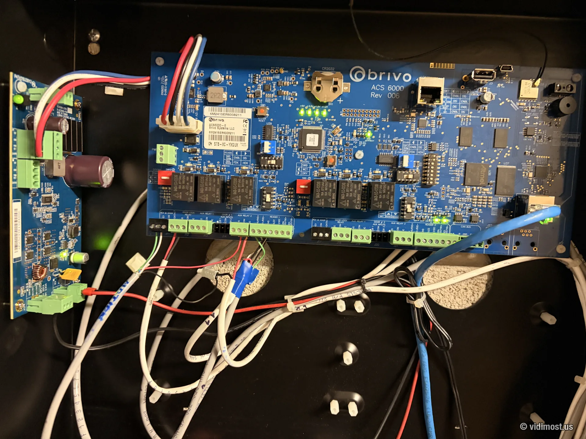 Brivo ACS6000 main board wired inside a black enclosure on a live Vidimost installation in Chicago